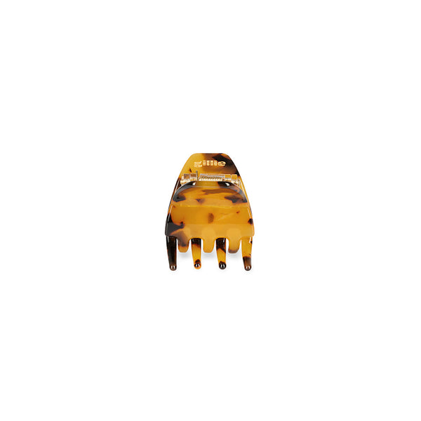 Detailansicht unserer 3,5 cm großen Mini-Haarklammer in Tortoise aus Bio-Acetat – mit goldener „gillie“-Gravur auf der Oberseite.
