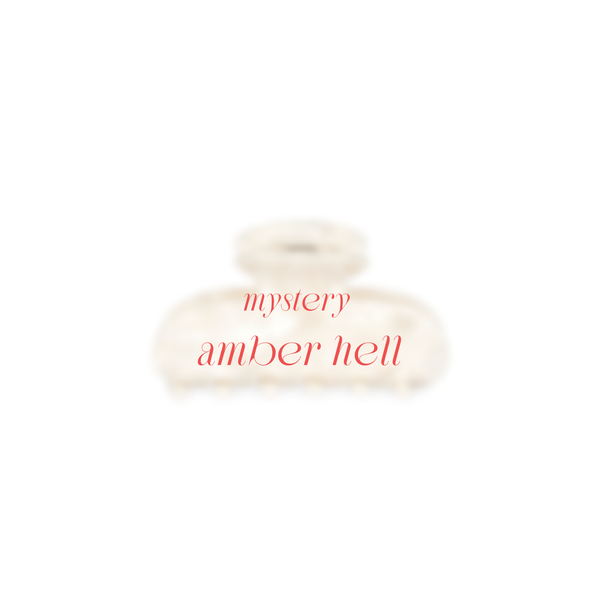 EIn Bild von der Amber Beige verschwommen mit dem Text in Rot Mystery Amber Hell