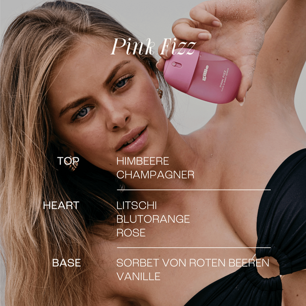 Model mit gillie Pink Fizz Hair & Body Spritz und Duftpyramide mit Champagner, Himbeere, Litschi, Blutorange, Rose, Vanille und Beerensorbet.